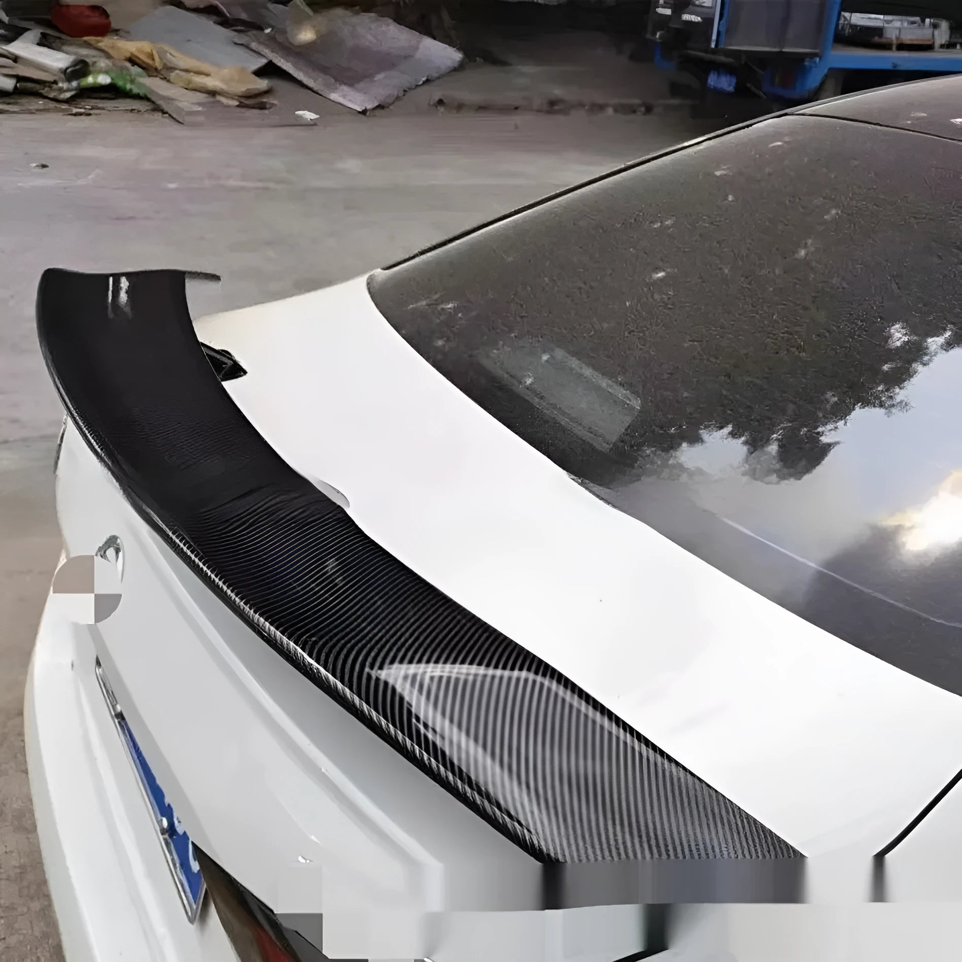 Universal punch-free ABS plastic car spoiler tail wing in black, white, carbon pattern, or blank finish.
