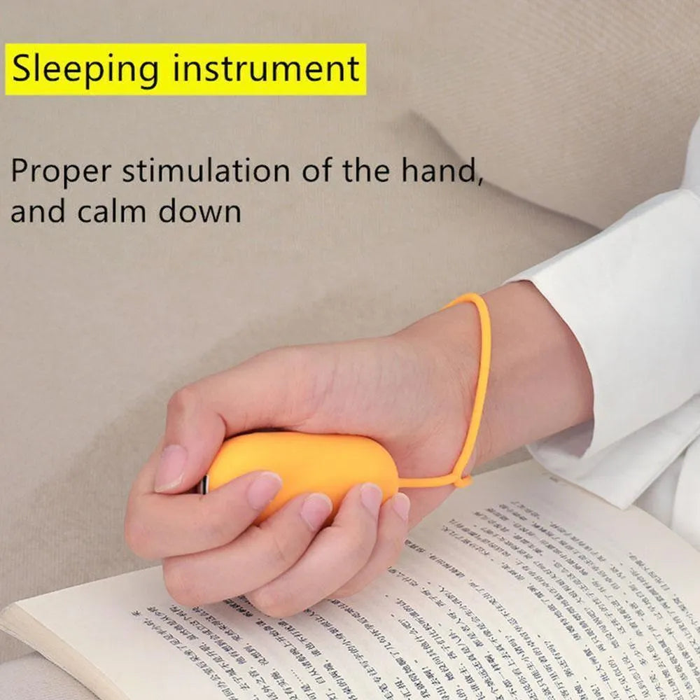 Handheld micro-current sleep aid device in grey colour with USB charging cable
