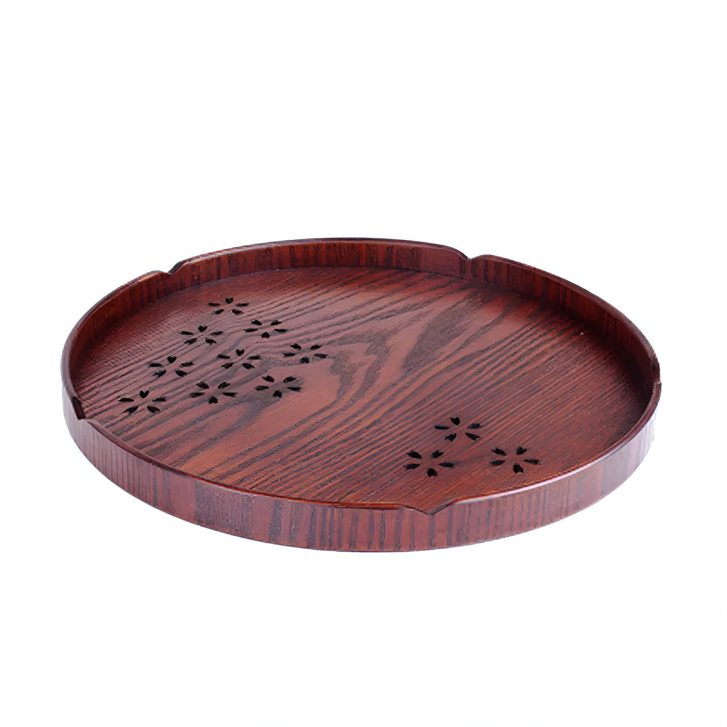 Wooden shallow plate with carved hollow cherry blossom pattern, 30cm in diameter.