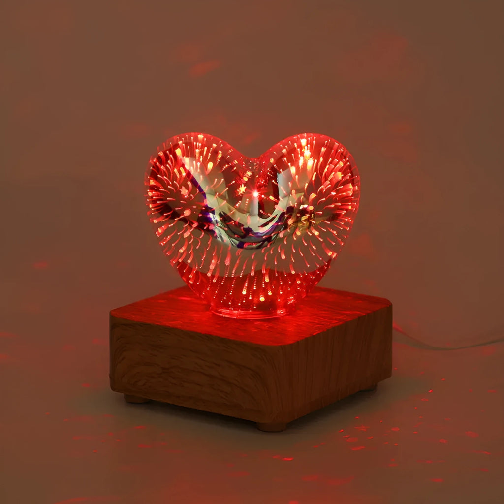 3D love glass small night lamp with silver electroplated finish and solid wood base on a bedside table