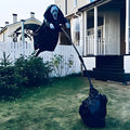 Plastic skeleton scarecrow Halloween decoration with screaming skull, measuring 70cm tall.