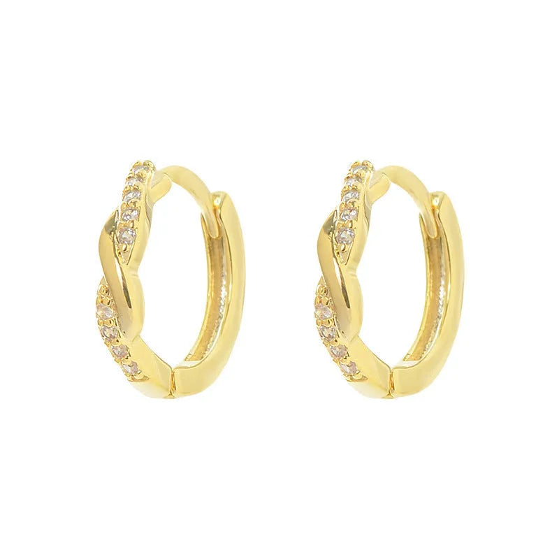 Gold geometric interwoven hemp rope earclip earrings on a white background