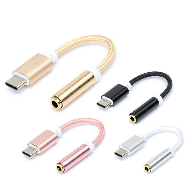 Short black nylon Type-C to 3.5mm female audio adapter cable on a white background.