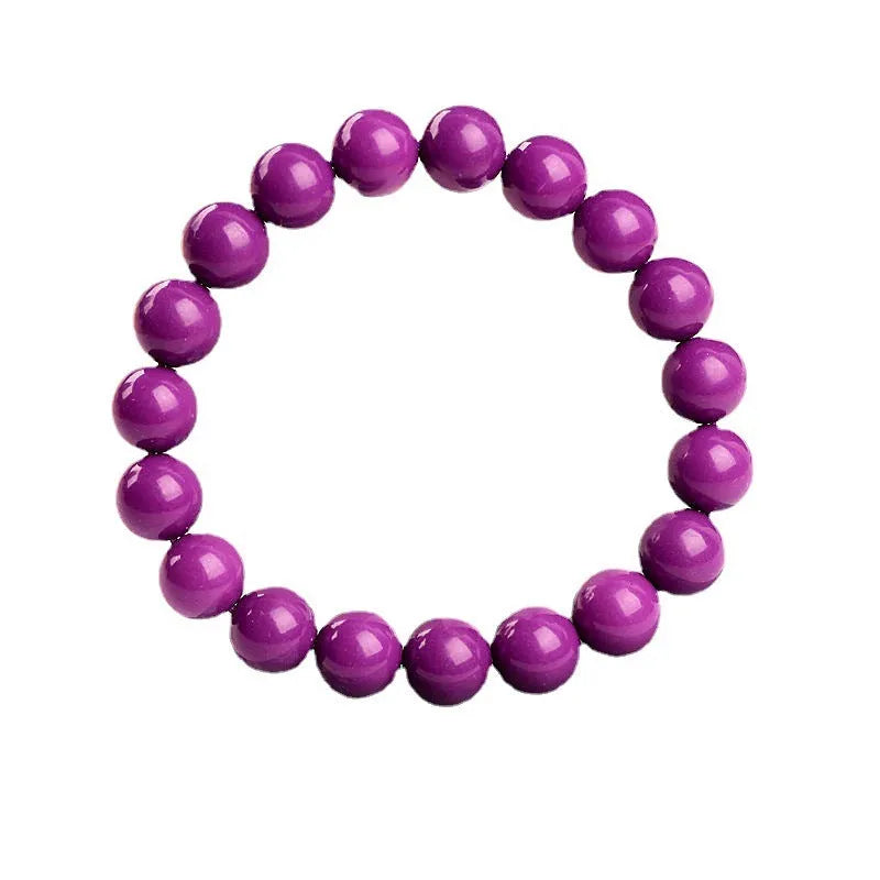 Purple mica crystal bracelet with polished beads, shown in unisex design.