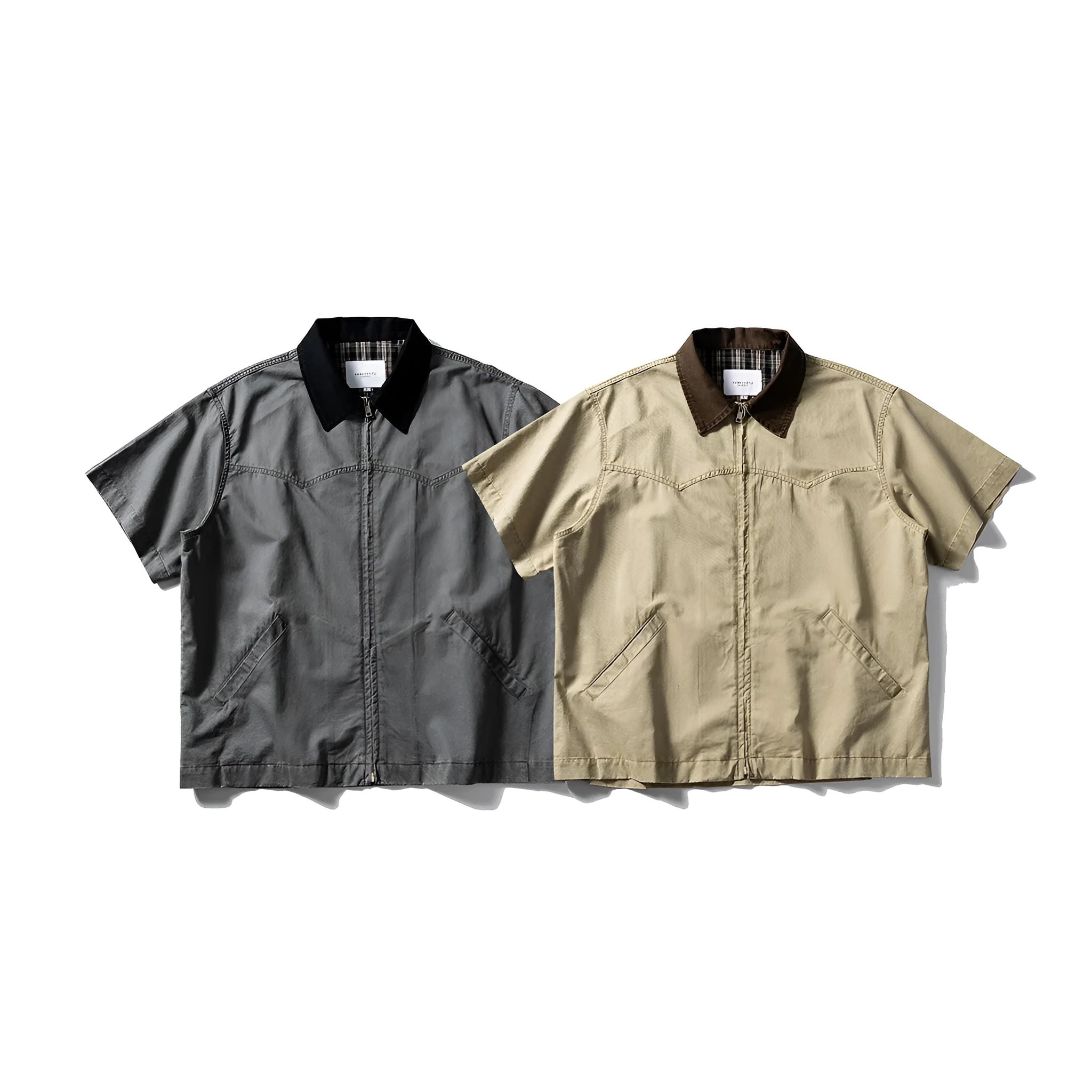 Grey washed cotton short sleeve overall shirt on a hanger, loose fit.