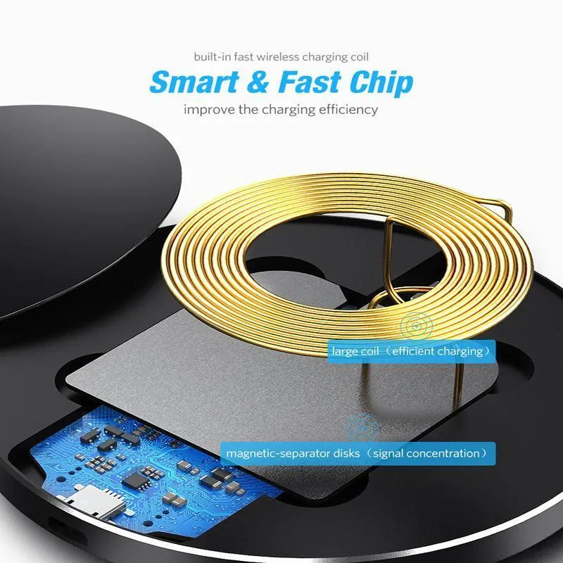 Ultra-thin black aluminium QI wireless charger with USB cable on wooden surface