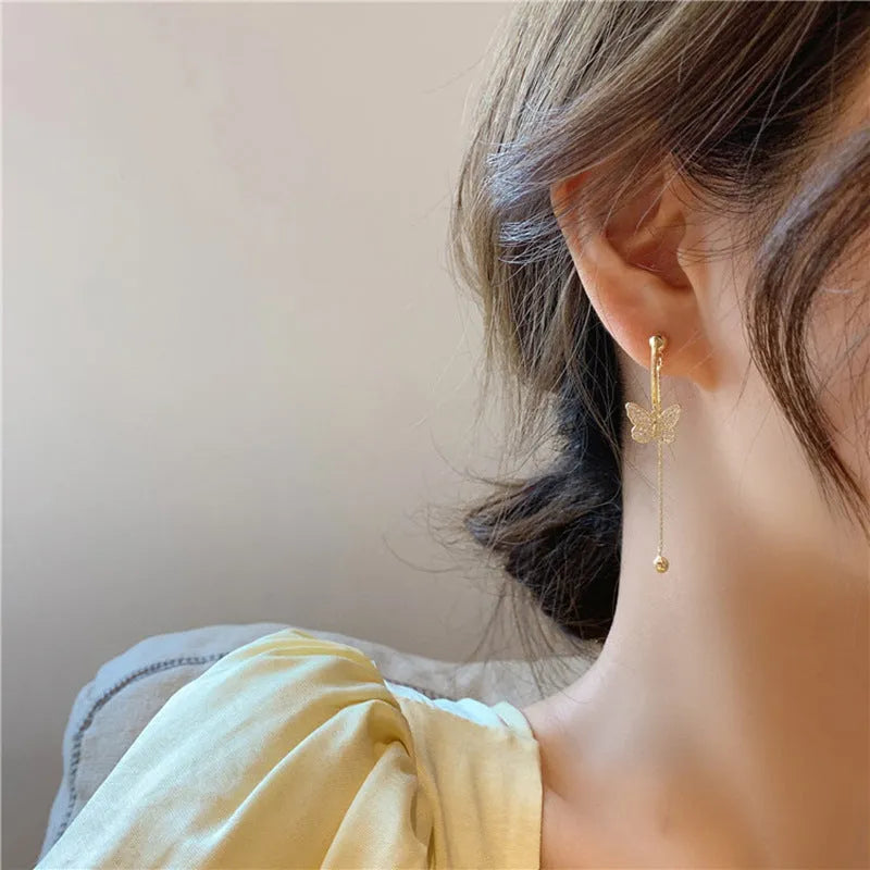 Alloy golden butterfly tassel earrings with electroplated finish for women