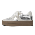 Retro beige and silver casual sports shoes with cross shoulder straps and round toe.
