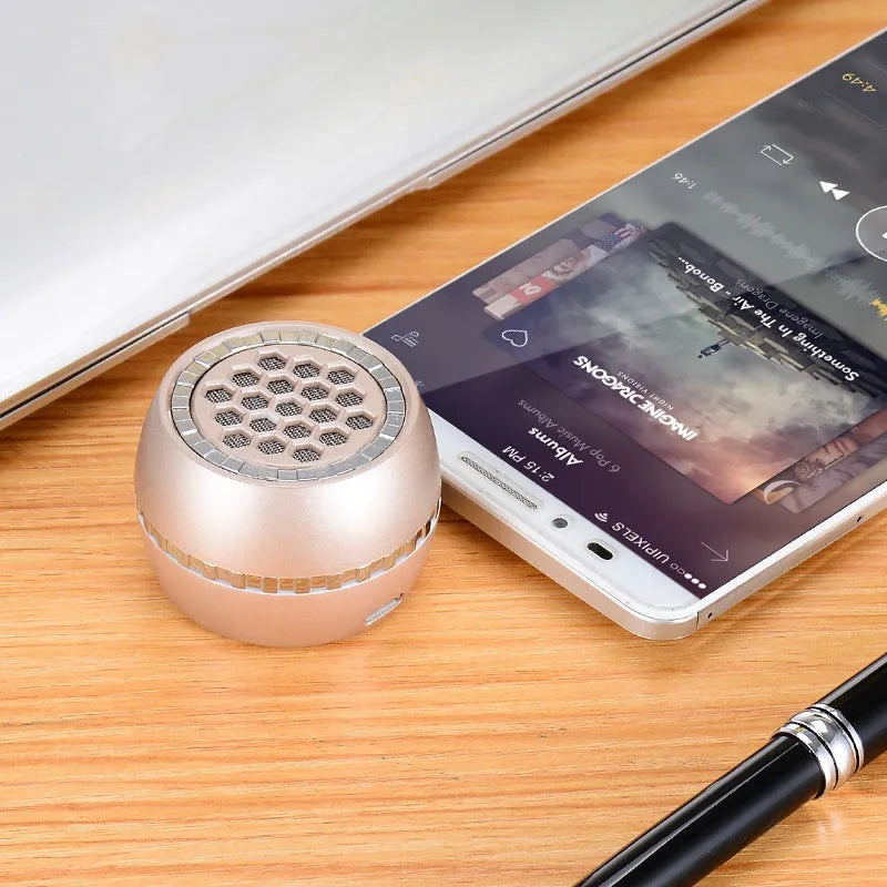 Universal single-channel portable speaker amplifier in black, local gold, and rose gold finishes.