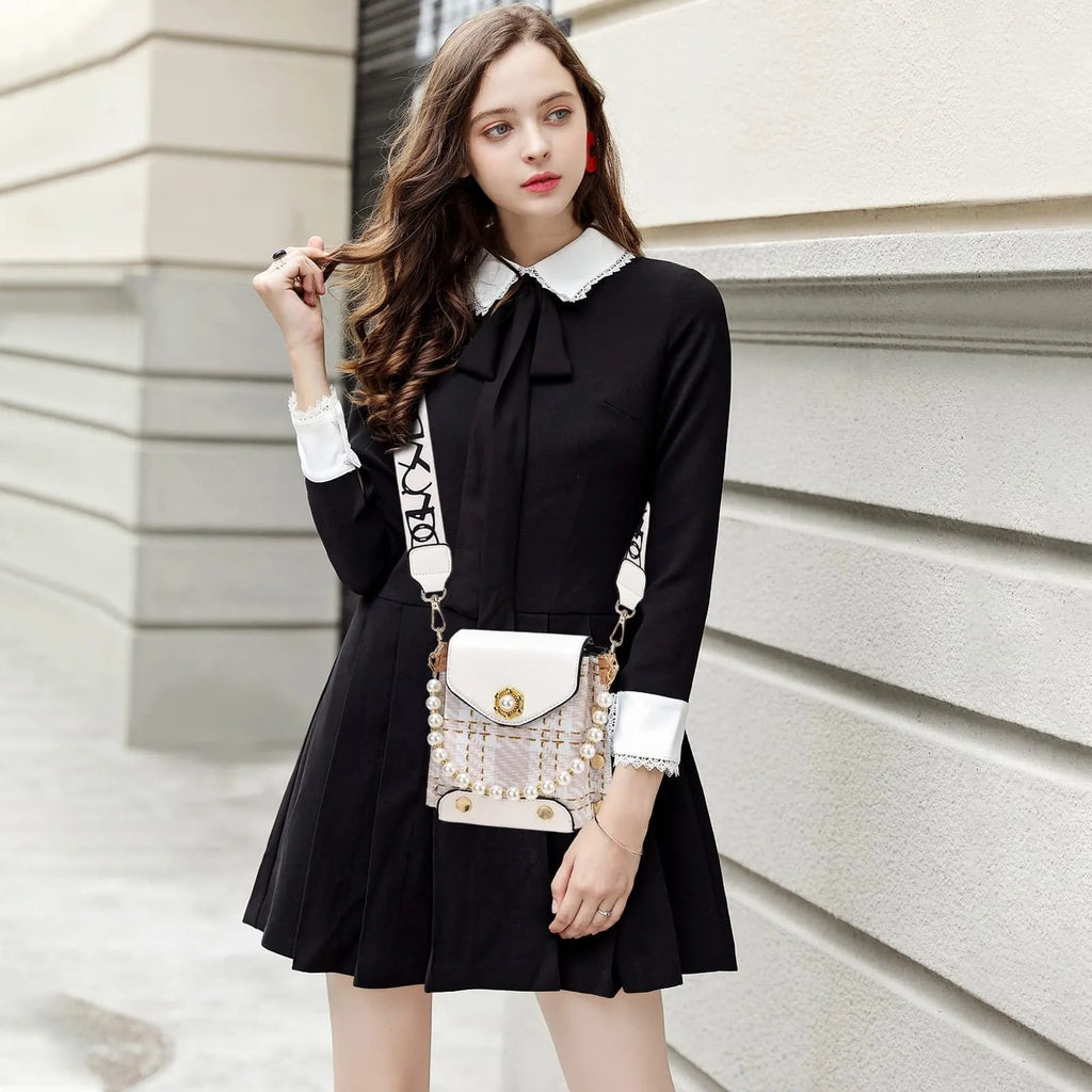 Women's crossbody phone bag in PU leather with pearl pendant and gold metal studs, magnetic flap closure