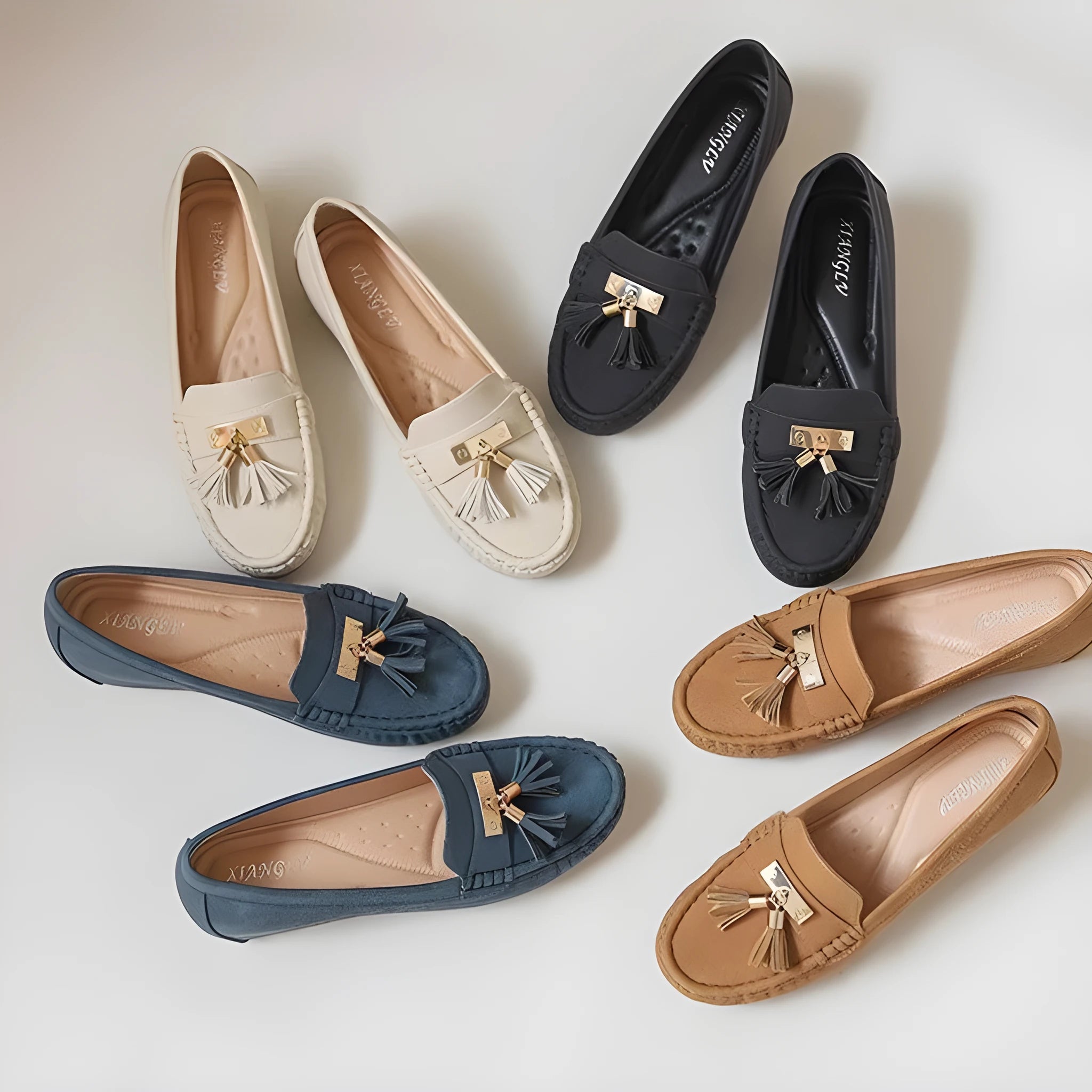 Women's flat heel height increasing insole shoe covers in beige, black, blue, and brown colours with a round toe.