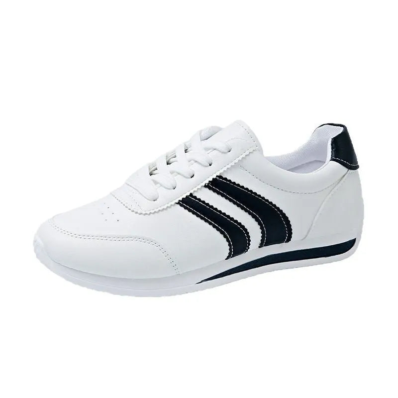 Blue casual lace up soft bottom sneaker with rubber sole and round toe, low top design