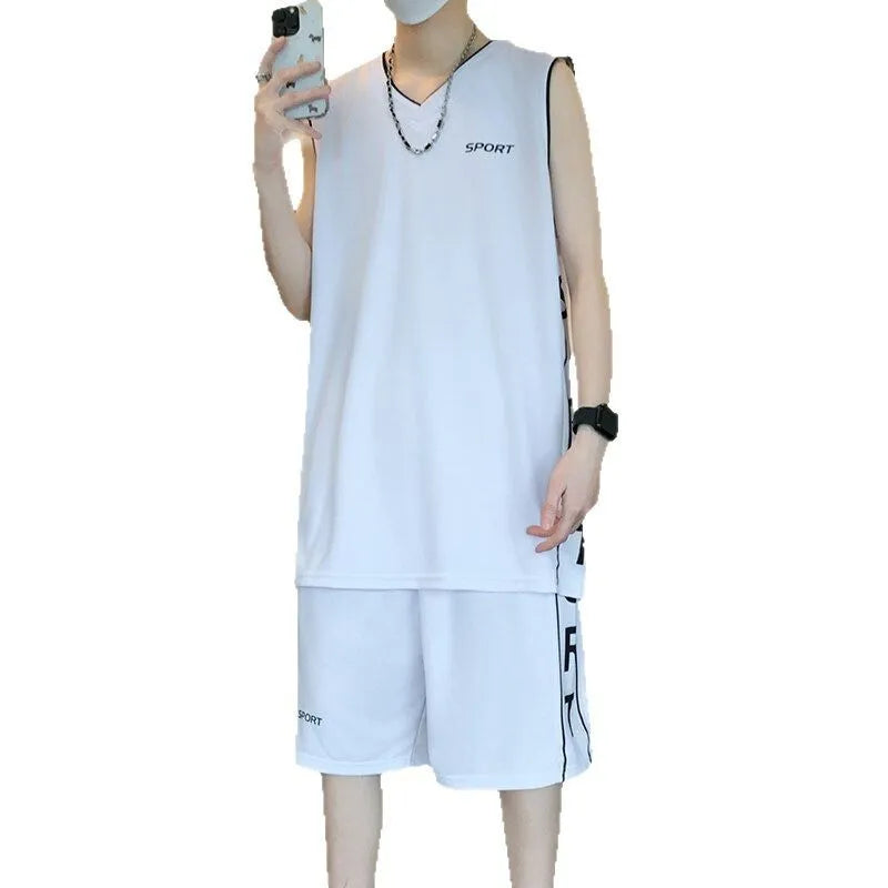 Polyester basketball sports suit with short sleeve vest and matching shorts in various colours