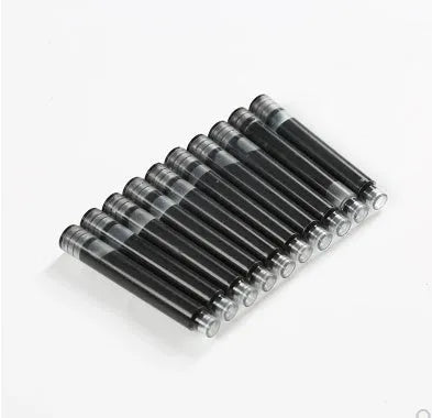 Ten steel ink sacs for fountain pen and dip pen repair laid out showing metal construction
