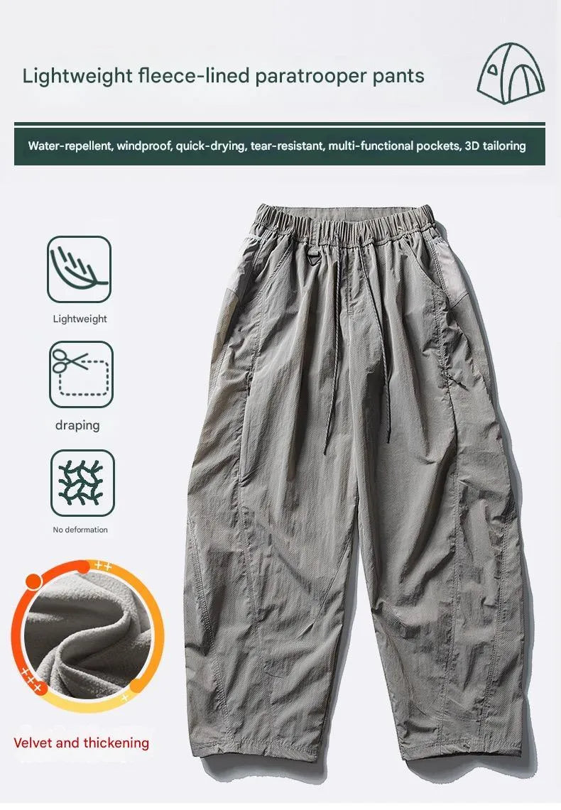 Fleece-lined quick-dry paratrooper cargo pants in army green with cargo pockets and adjustable cuffs