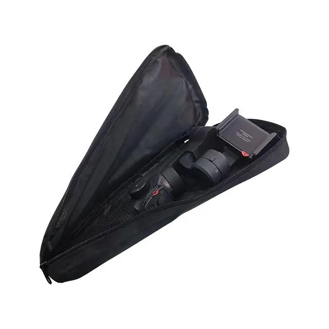 Black cloth zippered storage pouch for a mobile phone gimbal and its accessories on a table