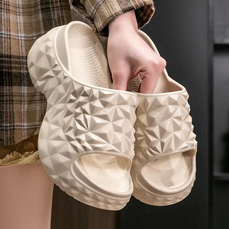 Women's khaki high heel Eva flip flop slippers with a thick sole on a white background.