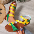 Women's flat sandals with a Velcro strap, in PU leather with a rubber sole.