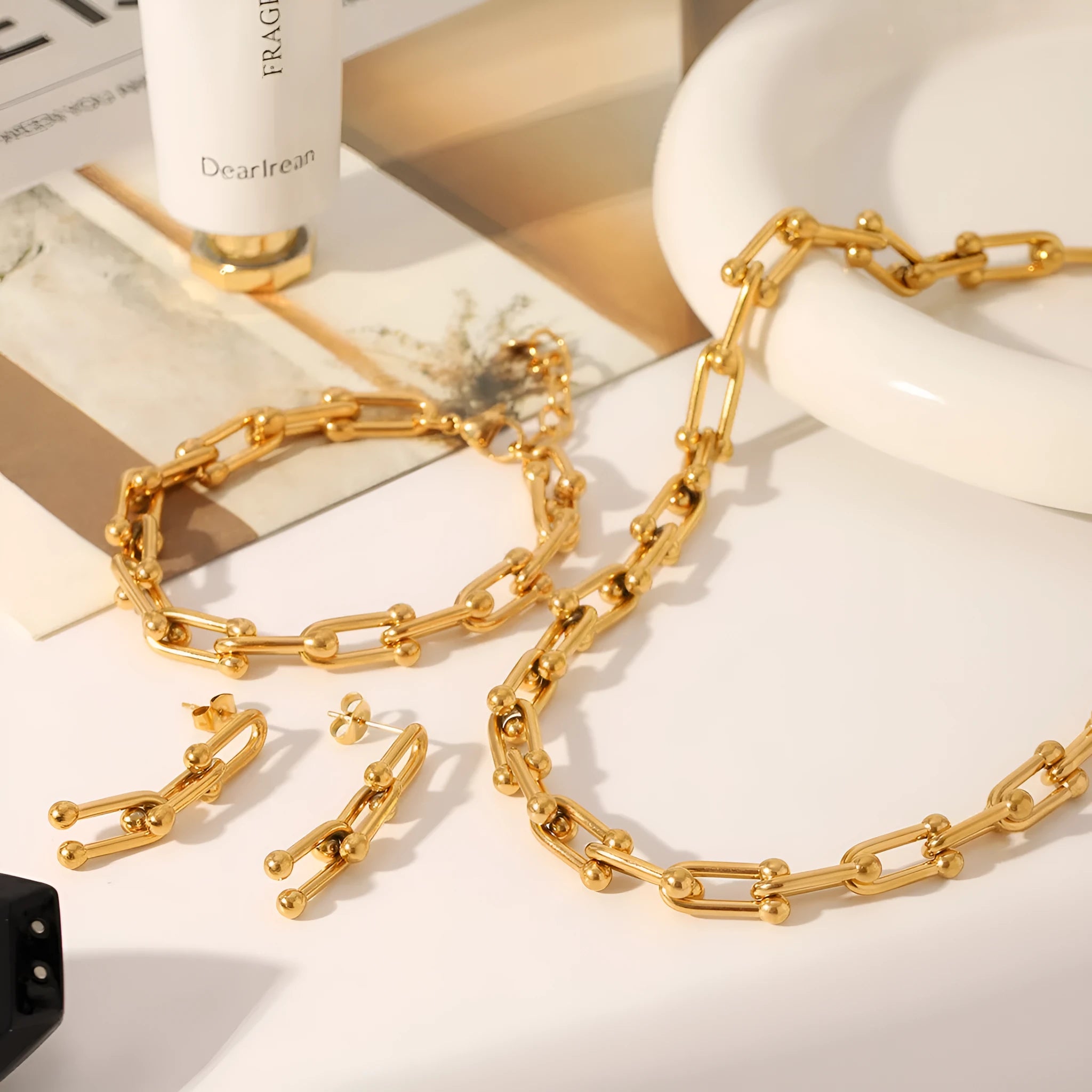 Stainless steel horseshoe necklace, bracelet and earrings set with titanium steel pendant and vacuum electroplating finish
