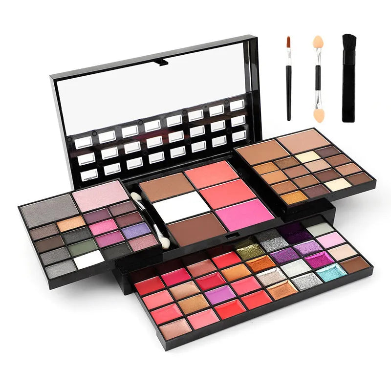 74 colour makeup palette set open to show eyeshadows, lip glosses and brushes in a plastic case with mirror