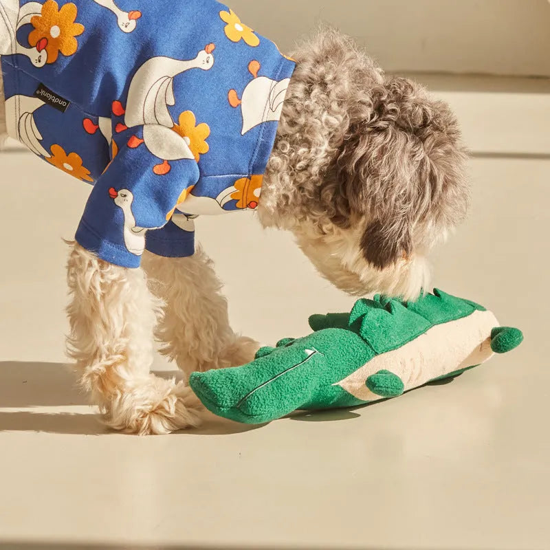 Green plush toy dog measuring 35cm long with soft stuffed animal construction