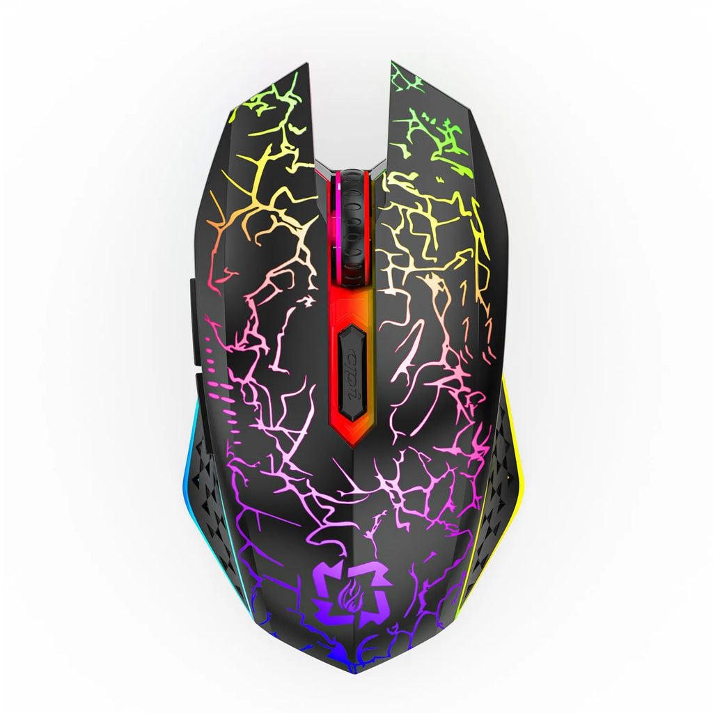 Black and white wireless gaming mouse with RGB lighting on desk with charging cable