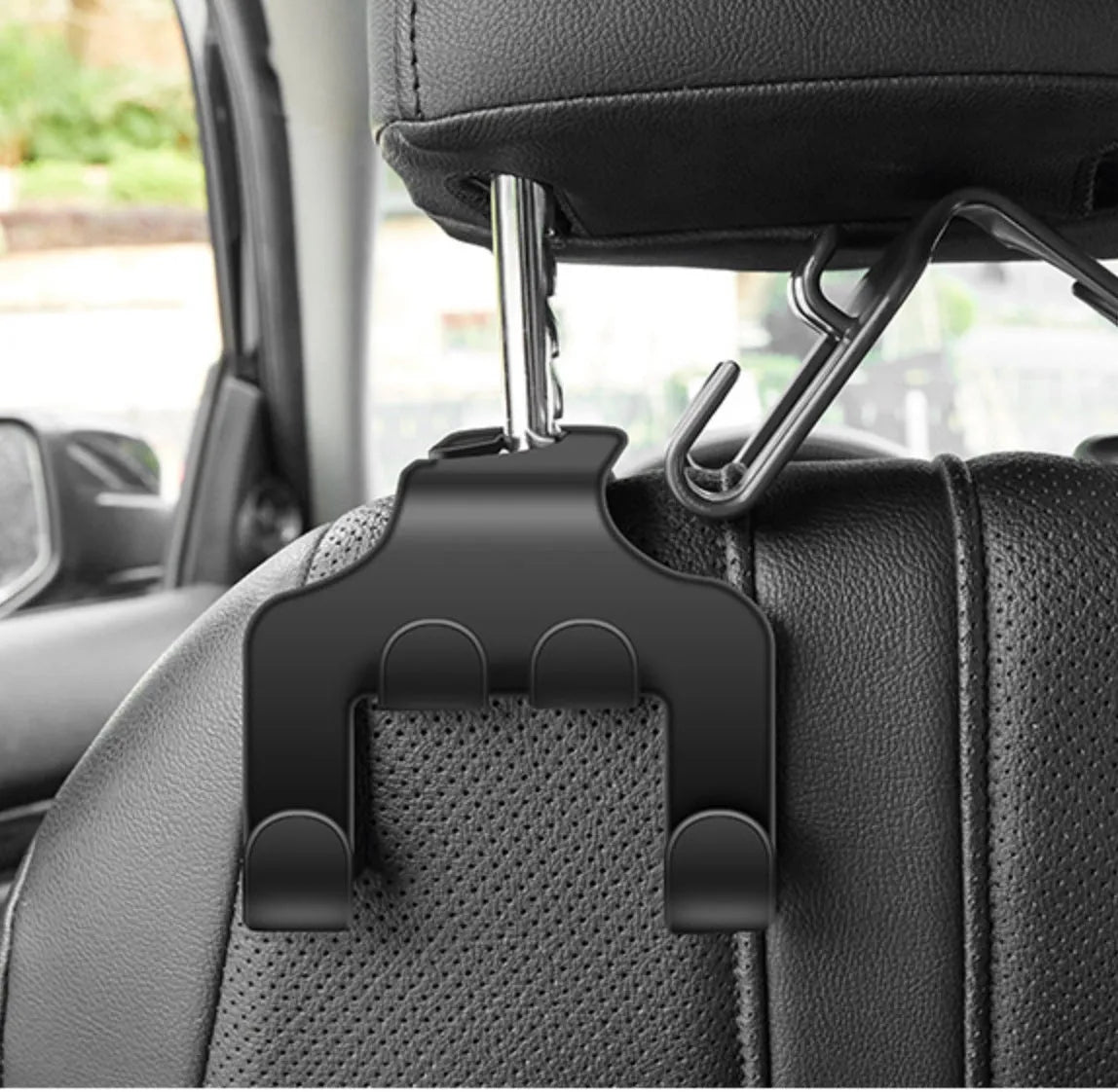 Car mounted multifunction hook made from white ABS material shown installed in vehicle