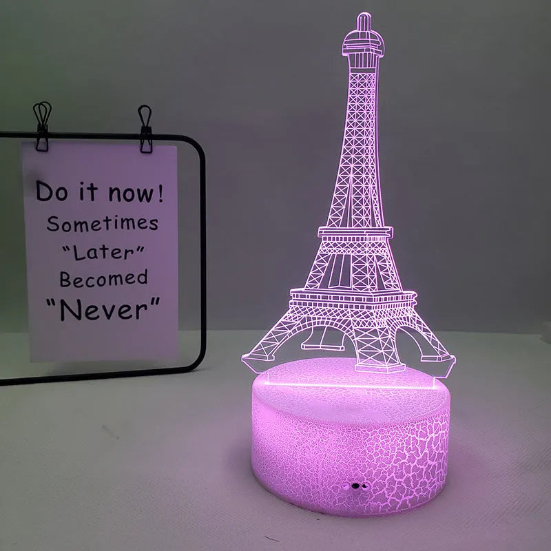 Eiffel Tower themed table lamp with multicolour LED glow on a acrylic shade.
