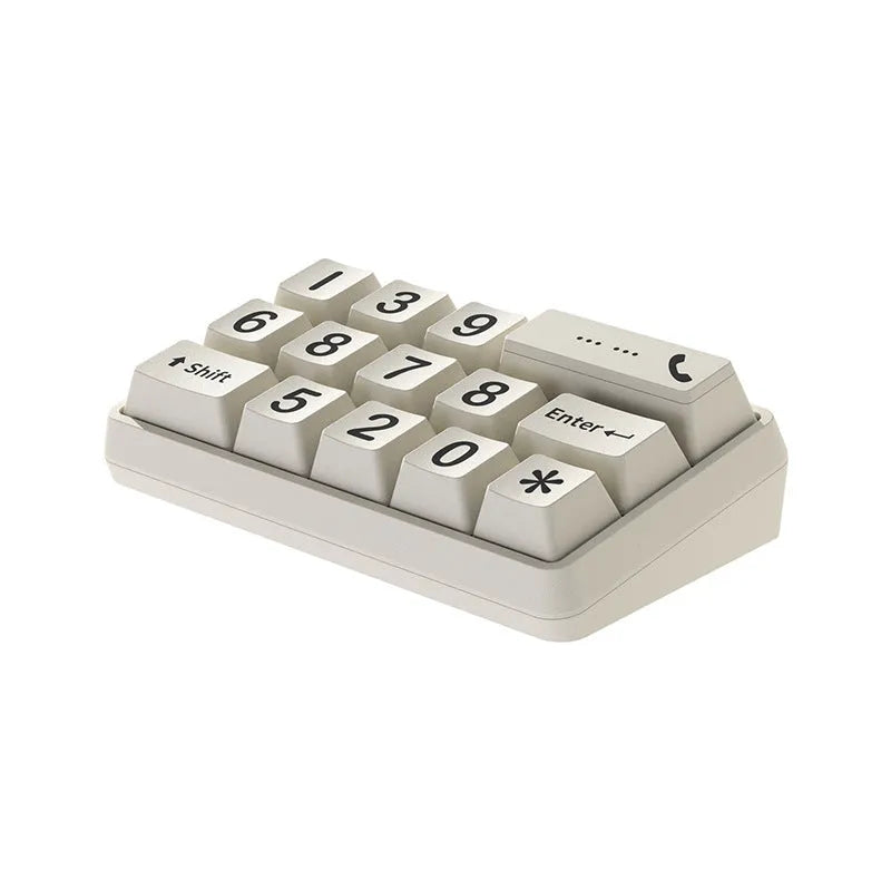 Creative typewriter-style temporary parking number plate in zinc alloy and ABS on a desk