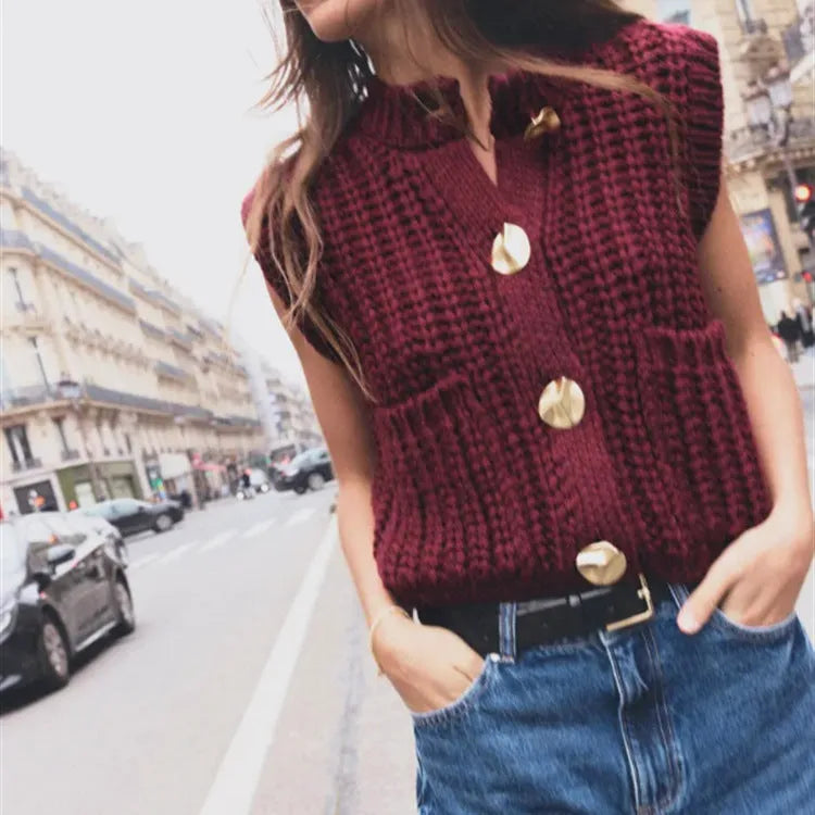 Women's button thick knitted short cardigan in apricot colour, front view, short length