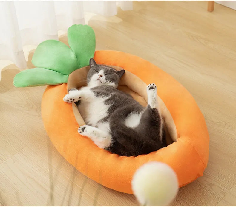 Carrot-shaped plush dog nesting bed with a soft blanket, shown in M and L sizes.