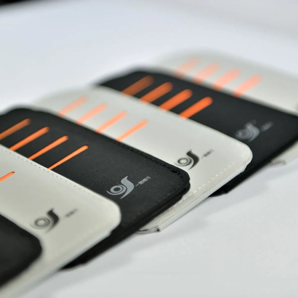 Car dashboard storage bag with four slots for sunglasses and cards, shown in grey.