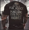 Mens black loose-fit polyester T-shirt with skull and slogan print on front, shown on model