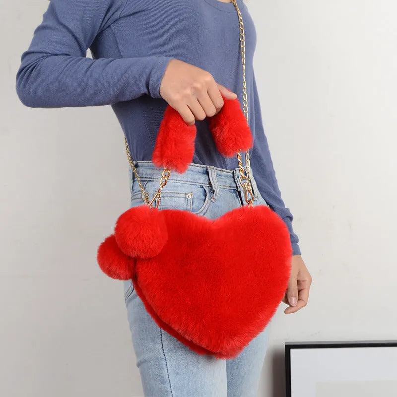 Heart-shaped soft plush women's handbag with zipper opening in medium size