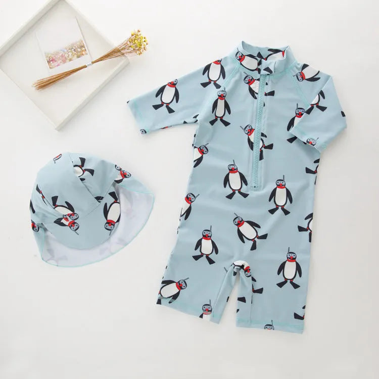 Boys' penguin print swimming costume set with long sleeves and matching swimming cap