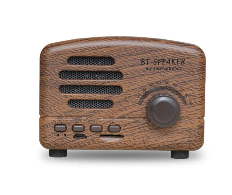 Vintage wood grain finish Bluetooth speaker with compact design on a wooden table.