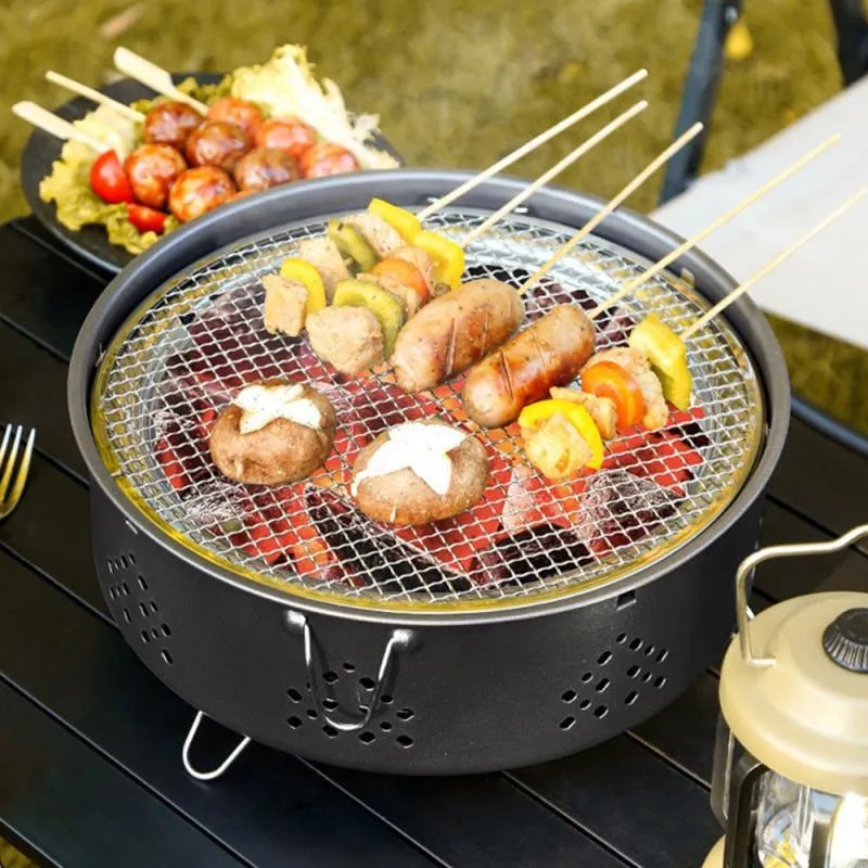 Portable stainless steel charcoal barbecue grill with detachable parts and storage bag for outdoor camping