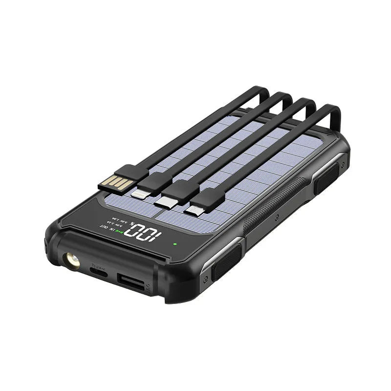 Black military-grade mobile power bank showing size next to a smartphone