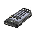 Black military-grade mobile power bank showing size next to a smartphone