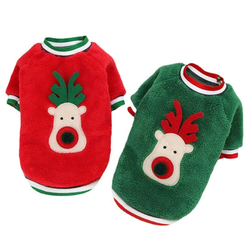 Red coral fleece dog sweater with reindeer hoodie on a small dog over a festive background