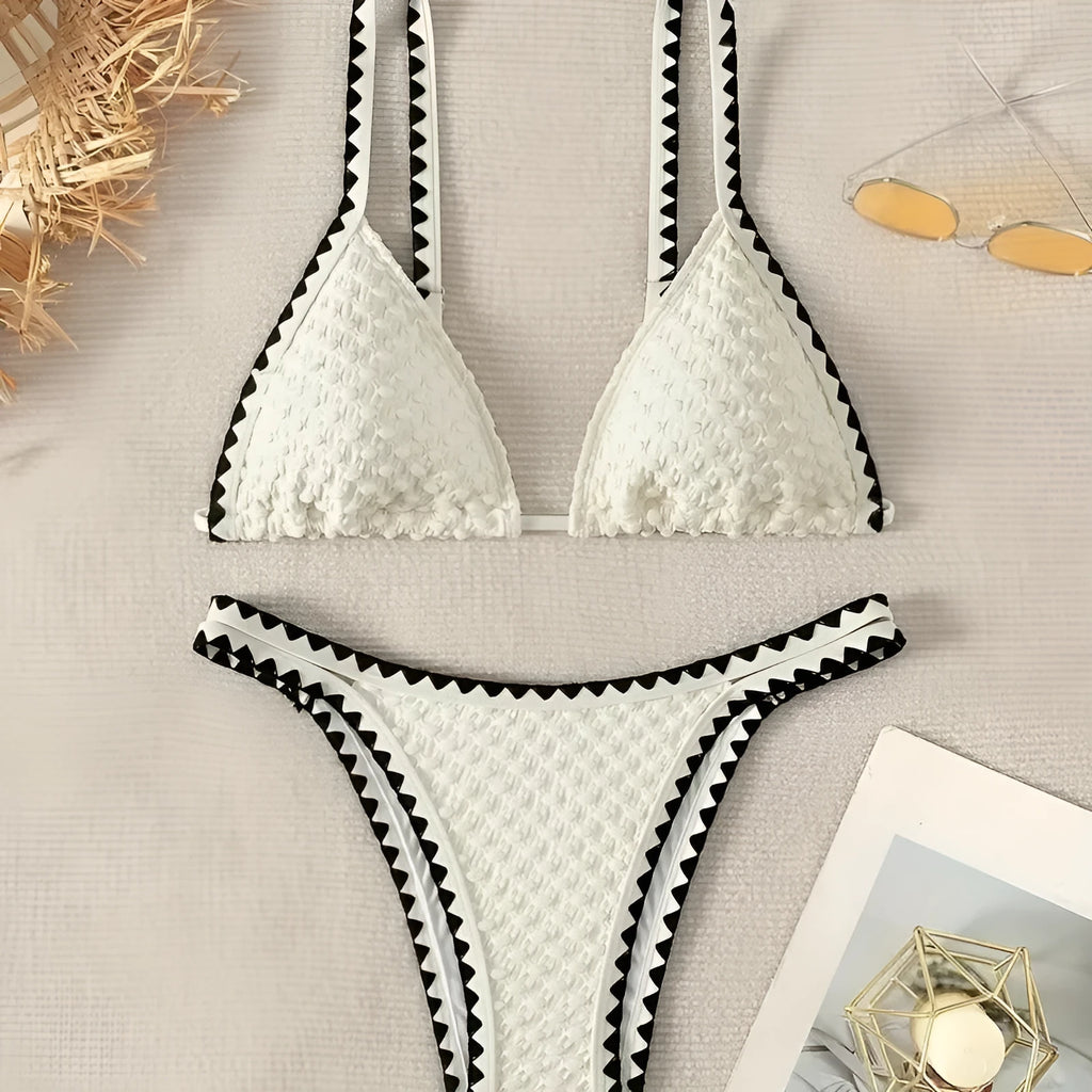 Women's white and blue split bikini swimsuit set with polyester fabric