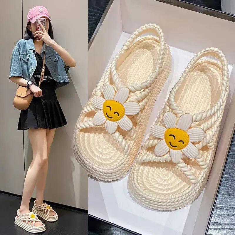 Beige PVC sandals with sunflower decoration and non-slip sole shown in size 36-37
