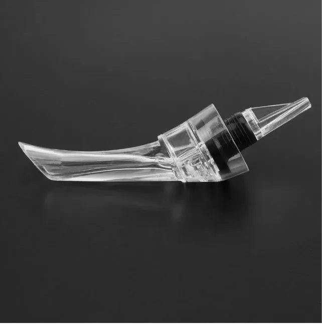 A clear acrylic wine aerator with a stainless steel filter, measuring 16cm long.