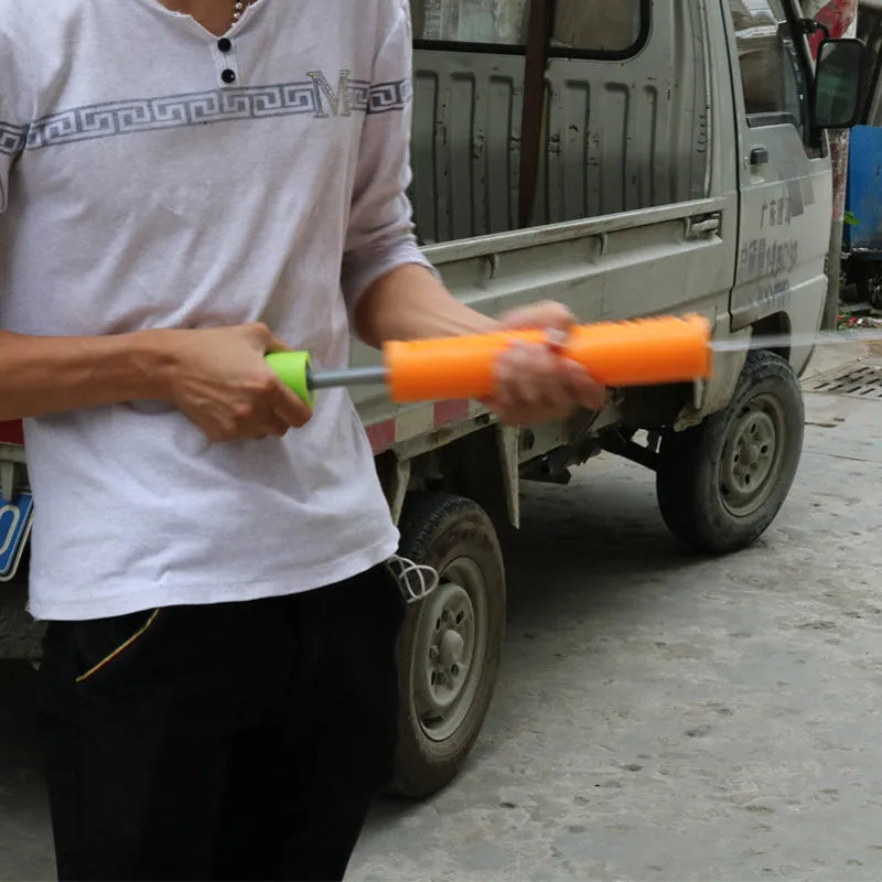 Orange EVA foam water blaster with pump action cannon mechanism and foam grip handle