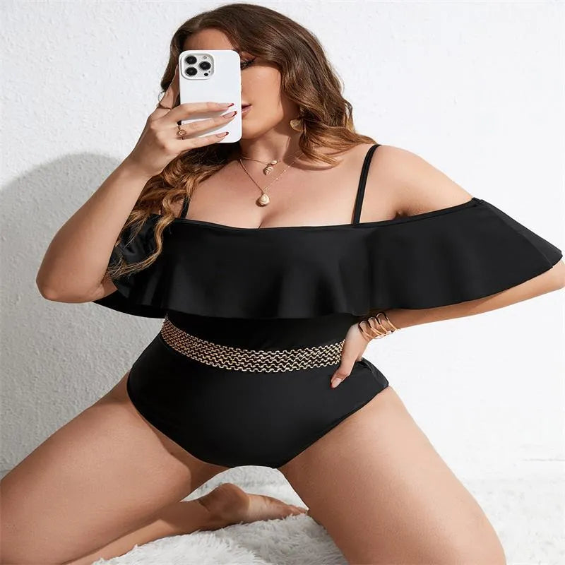 Black women's one-piece swimsuit in polyester fabric available in sizes 0XL to 4XL
