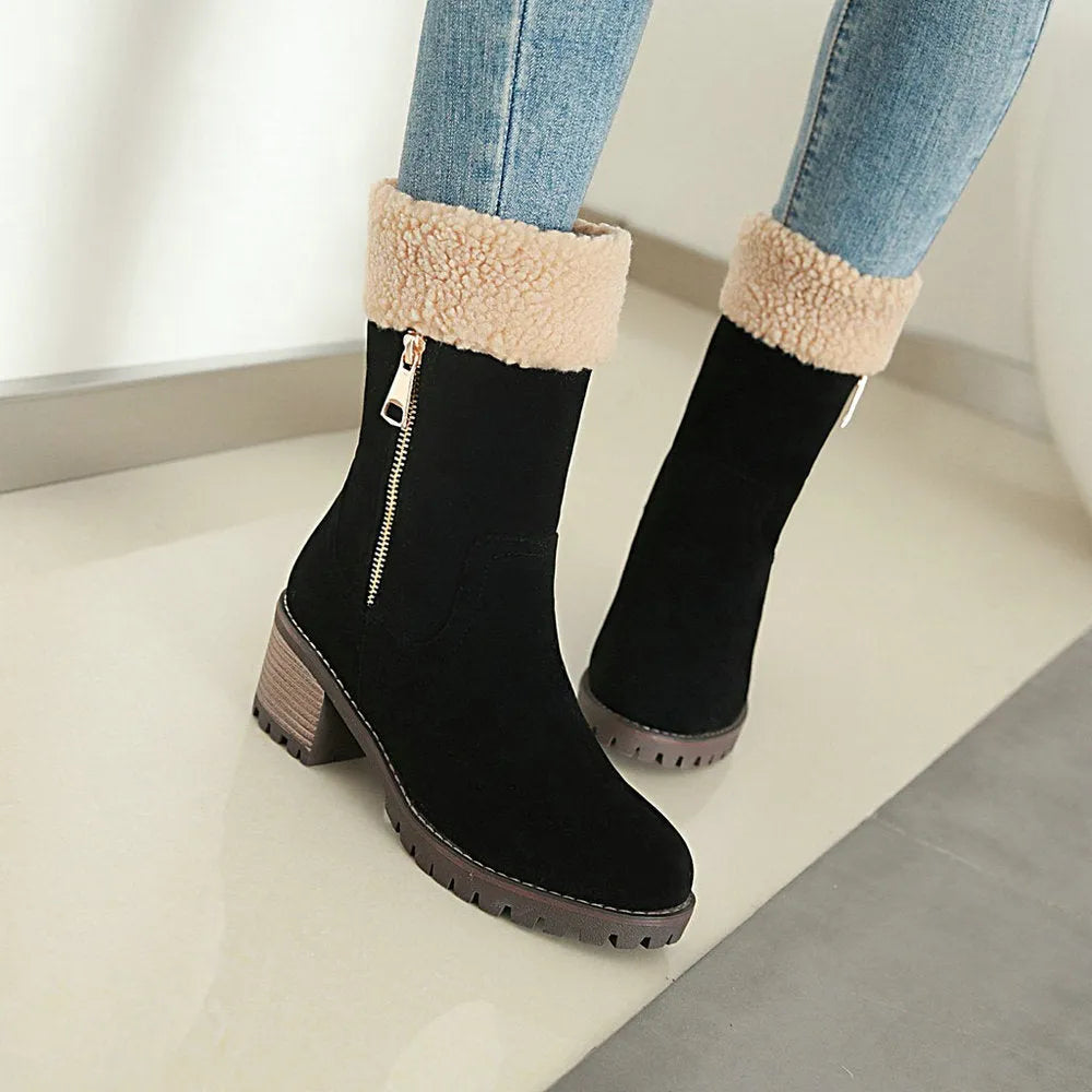 Men's black snow boot with thick rubber sole and warm lining, shown on a winter background.