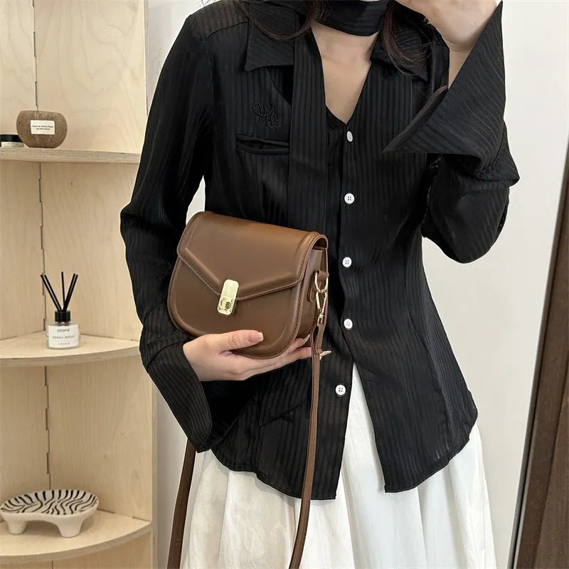Soft PU leather clamshell messenger bag in horizontal square shape, shown in khaki colour.