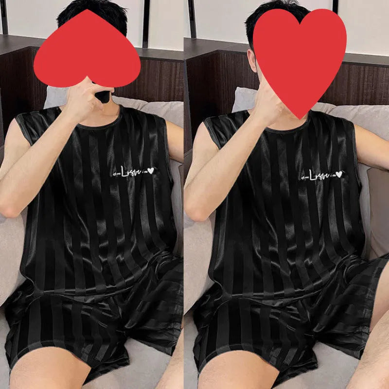Men's ice silk vest and shorts summer pajama set in black, sleeveless with embroidery, on a plain background.