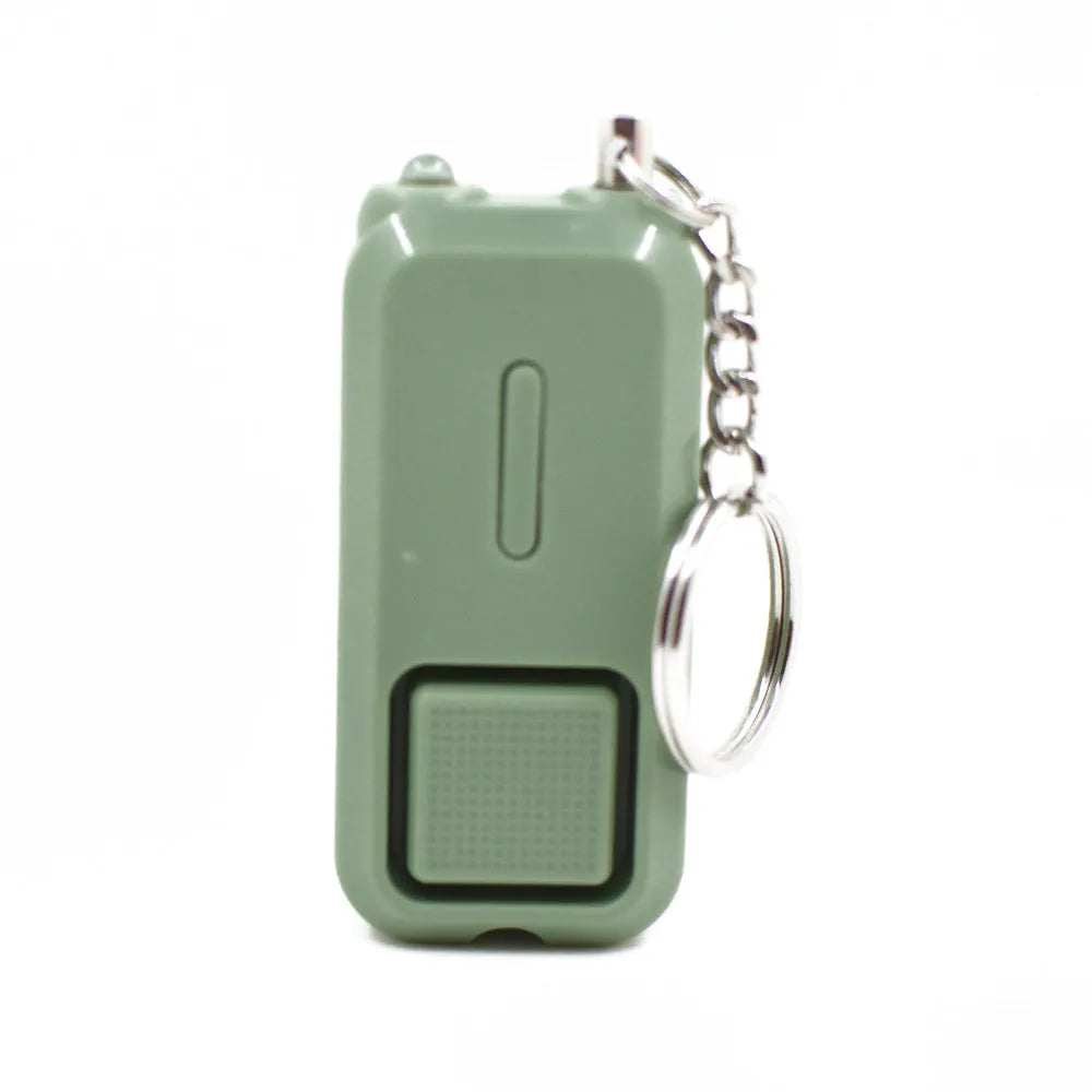 Personal safety alarm measuring 65x30x12mm in pink colour with 130dB sound