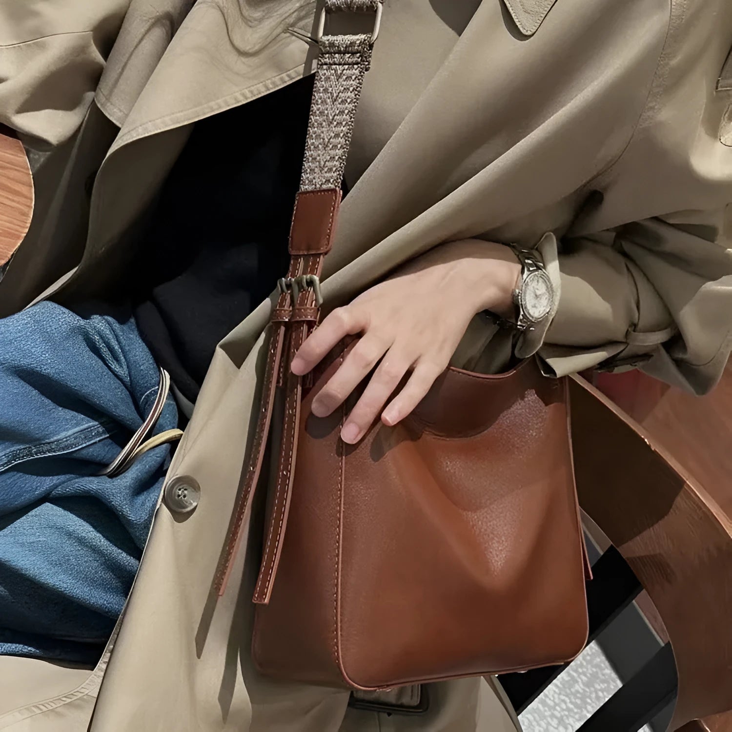 Genuine leather women's messenger bag with multiple internal compartments in black, sugar brown, golden brown, or dark green.